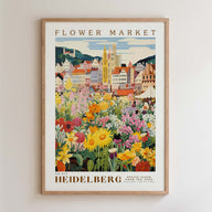 The image is a framed poster depicting a colorful and vibrant flower market in Heidelberg, Germany.