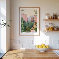 a kitchen counter with a bowl of lemons, a framed poster of Yosemite National Park, and a shelf with jars and bottles.