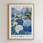 The image is a framed poster depicting a vibrant flower market in Calgary, Canada.