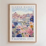 The image is a framed poster depicting a colorful and vibrant scene of a flower market in Valencia, Spain.