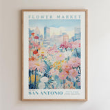 The image is a framed poster depicting a vibrant and colorful flower market in San Antonio, Texas.