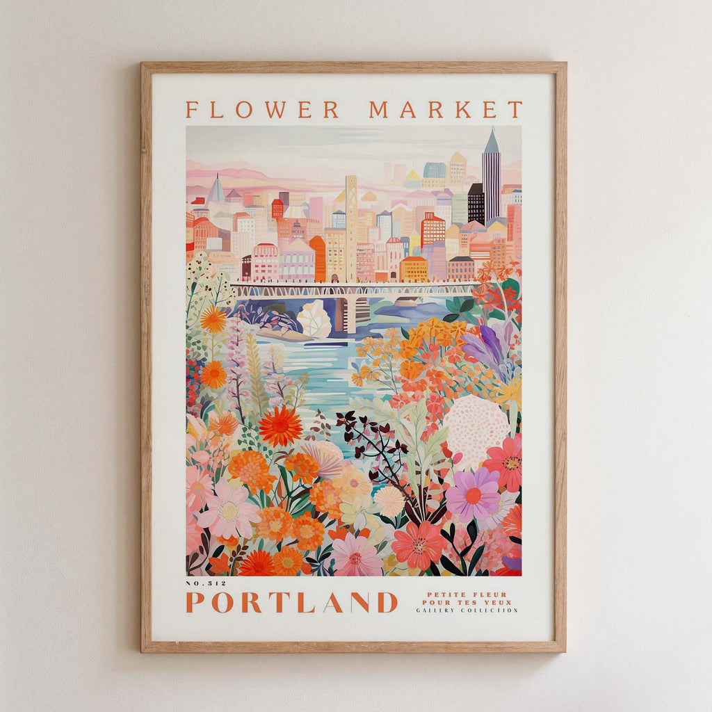 The image is a framed poster depicting a cityscape with a river and colorful flowers in the foreground.