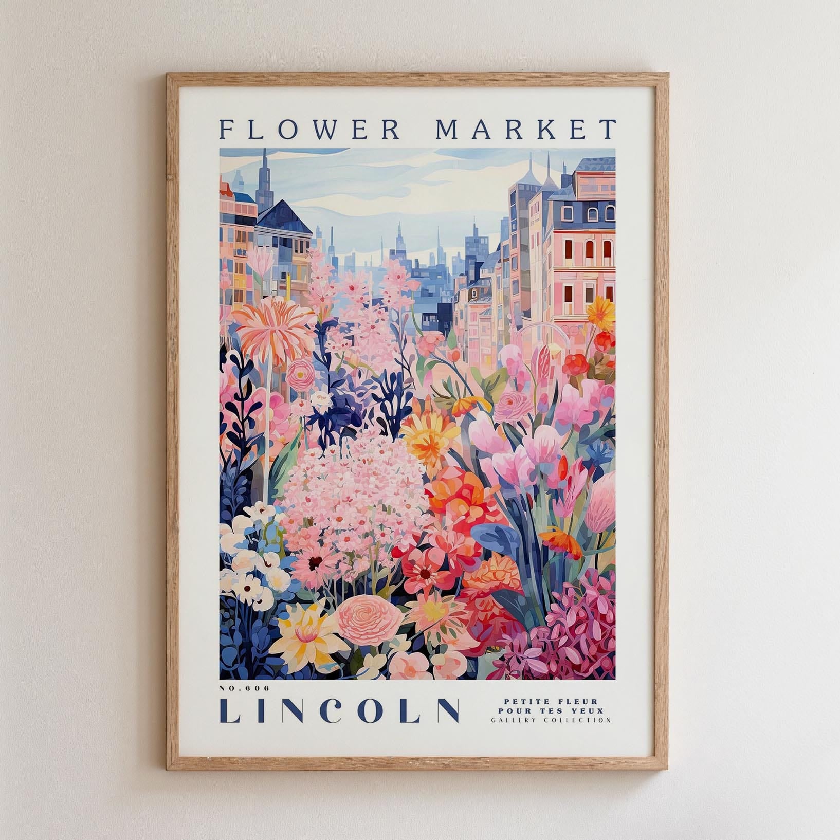 A framed poster depicting a vibrant and colorful flower market in Lincoln, with a variety of flowers and buildings in the background.