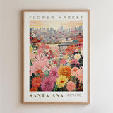 The image is a framed poster depicting a vibrant and colorful flower market in Santa Ana, California.