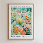 The image is a framed poster depicting a vibrant and colorful garden scene with various flowers and plants.