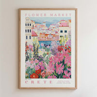 The image is a framed poster depicting a vibrant and colorful flower market in Crete, Greece.