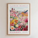 The image is a framed poster depicting a vibrant and colorful flower market in Jackson, New York.