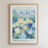 The image is a framed poster depicting a flower market in Virginia Beach, with a cityscape in the background.