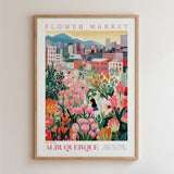 The image is a framed poster depicting a vibrant and colorful flower market in Albuquerque, New Mexico.