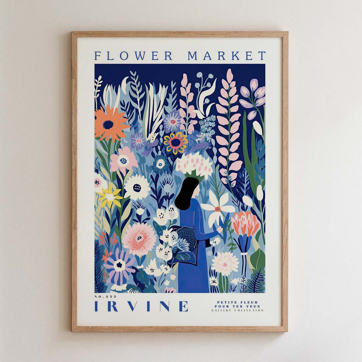 The image is a framed poster advertising a flower market. It features a woman standing amidst a colorful array of flowers and plants, with the text "FLOWER MARKET" prominently displayed.