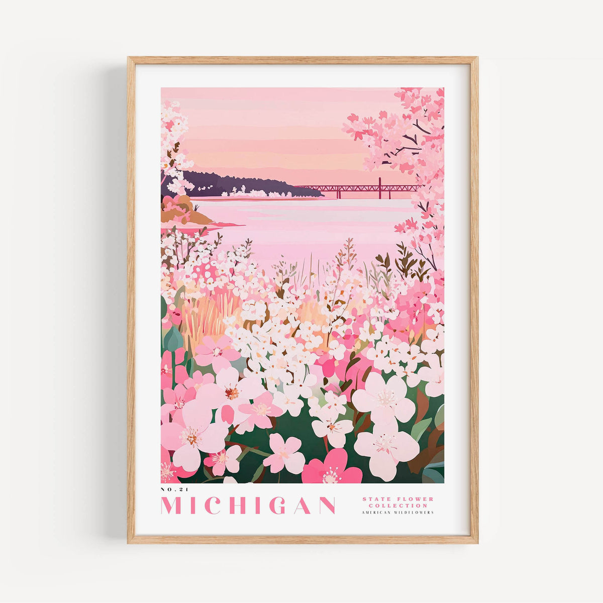 A framed poster depicting a scenic view of a lake surrounded by a field of pink flowers, with a bridge in the background.