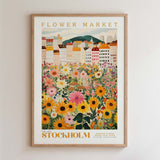 The image is a framed poster depicting a vibrant flower market in Stockholm, Sweden.