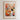 The image is a framed poster depicting a woman standing in a flower market in Barcelona, surrounded by a variety of colorful flowers.