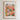The image is a framed poster depicting a vibrant and colorful flower market scene with various flowers and plants.