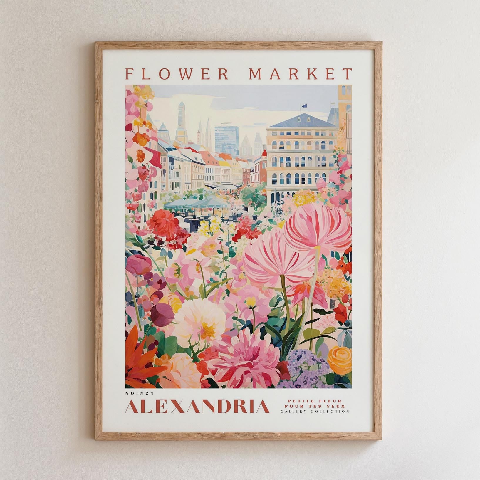 The image is a framed poster depicting a vibrant and colorful flower market in the city of Alexandria, with buildings and flowers in the background.