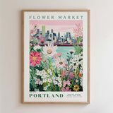 The image is a framed poster depicting a cityscape with a flower market in the foreground.