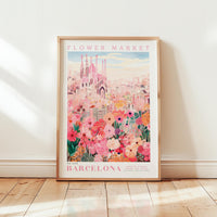 The image is a framed poster of the Barcelona Flower Market, featuring a colorful illustration of the market with various flowers and buildings.