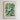 The image is a framed poster of a flower market in Charleston, featuring a variety of colorful flowers and plants.