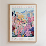 The image is a framed poster depicting a vibrant and colorful flower market in San Jose, California.