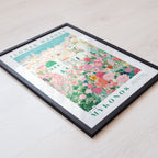 The image is a framed poster or print featuring a colorful illustration of a flower market in Mykonos, Greece.