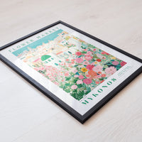 The image is a framed poster or print featuring a colorful illustration of a flower market in Mykonos, Greece.