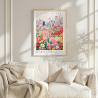 a framed poster of a flower market in Houston, with a cityscape in the background.
