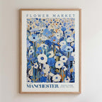 The image is a framed poster of a flower market in Manchester, UK.