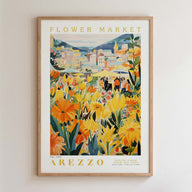 The image is a framed poster depicting a vibrant and colorful flower market in Arezzo, Italy.