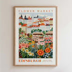 The image is a framed poster depicting a colorful and vibrant flower market in Edinburgh, Scotland.
