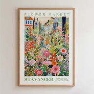 The image is a framed poster depicting a vibrant and colorful flower market scene.