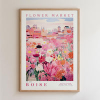 The image is a framed poster depicting a vibrant and colorful flower market in Boise, Idaho.