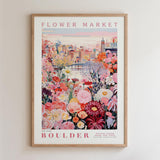 The image is a framed poster depicting a vibrant and colorful flower market in Boulder, Colorado.