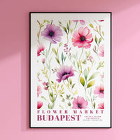 a picture of a flower market poster on a pink wall