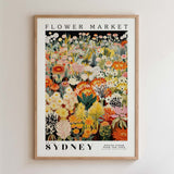 The image is a framed poster depicting a vibrant and colorful flower market in Sydney, Australia.