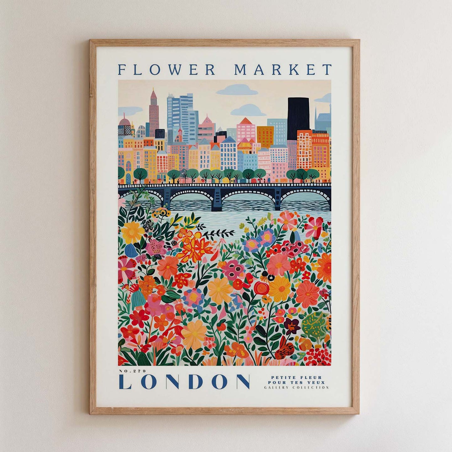 The image is a framed poster depicting a cityscape with a bridge and a flower-filled river in the foreground.