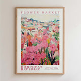 The image is a framed poster depicting a vibrant and colorful scene of a flower market in the Dominican Republic.