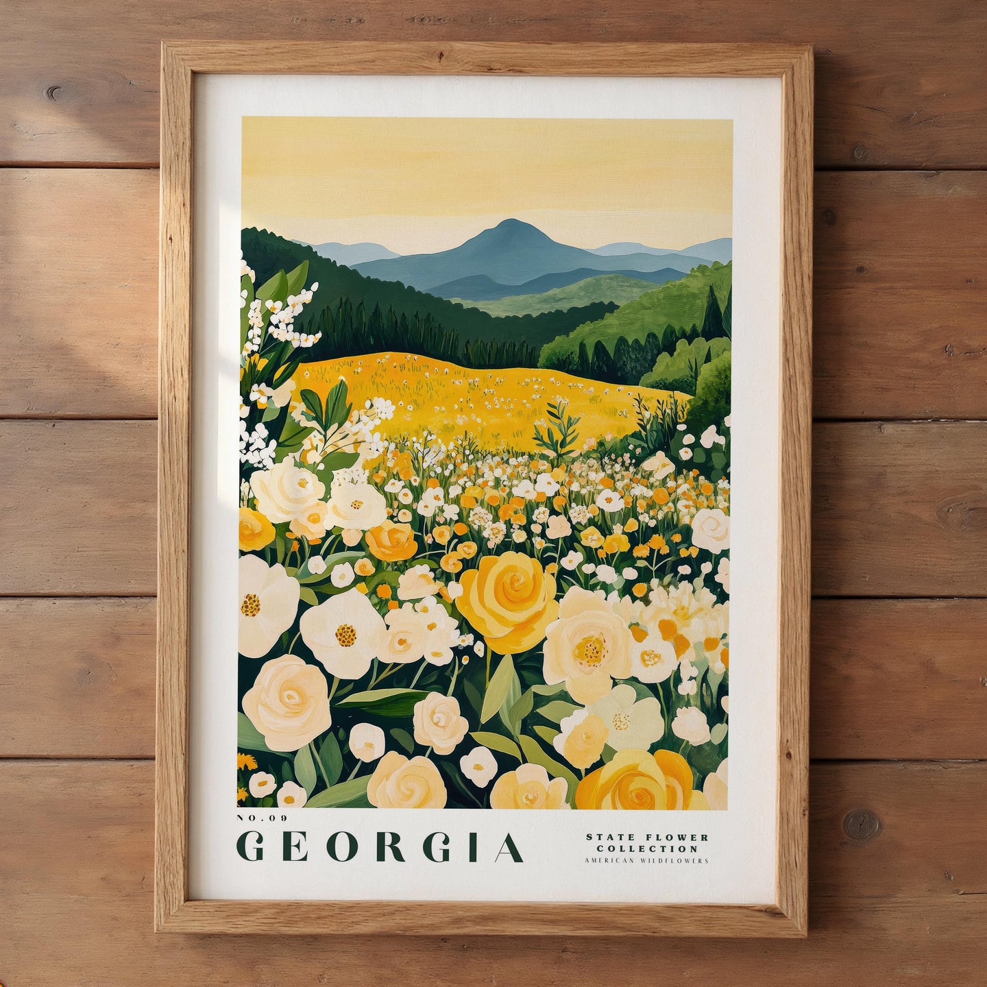 A framed print depicting a scenic landscape of a field filled with yellow flowers, surrounded by mountains and trees, with the text "No.09 Georgia State Flower Collection" and "American Wildflowers" below.