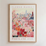 The image is a framed poster depicting a cityscape with a flower market in the foreground.