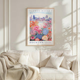 a framed poster of a flower market in Houston, with a cityscape in the background.
