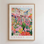 The image is a framed poster depicting a vibrant and colorful flower market in London.