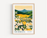 A framed poster depicting a scenic landscape of a field filled with yellow flowers, with mountains in the background.