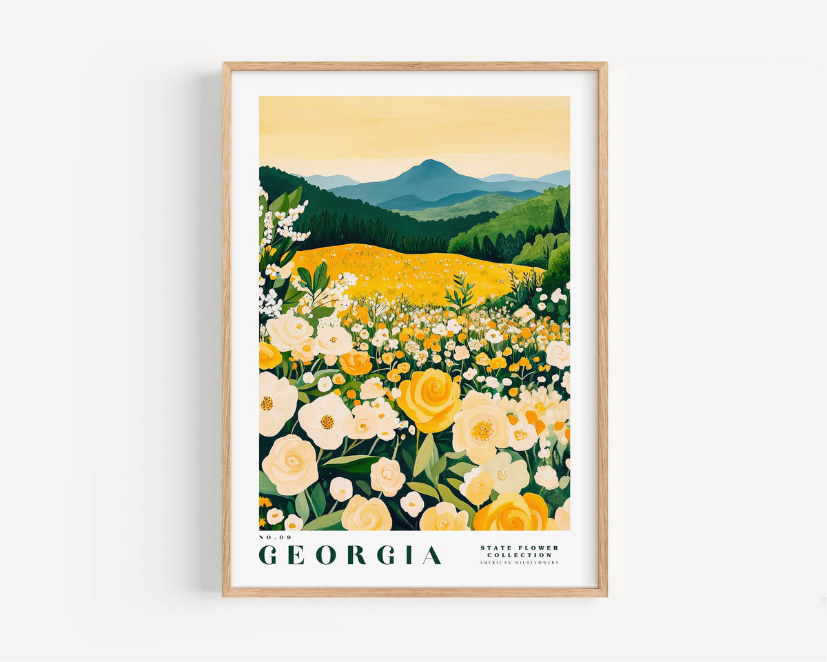 A framed poster depicting a scenic landscape of a field filled with yellow flowers, with mountains in the background.