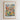 The image is a framed poster depicting a vibrant and colorful cityscape with a variety of flowers and plants in the foreground.