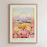 The image is a framed poster depicting a cityscape with a ferris wheel in the background, surrounded by a colorful array of flowers.