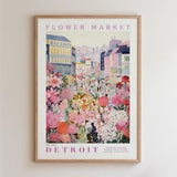 A framed poster depicting a vibrant and colorful flower market in Detroit, Michigan.