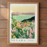 The image is a framed print depicting a scenic landscape of mountains, a lake, and a field of colorful wildflowers in Nevada.