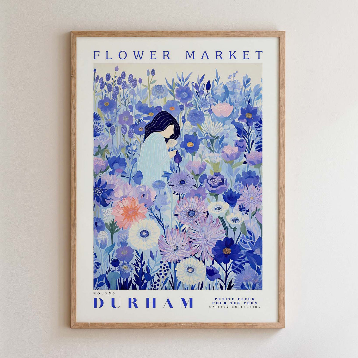 The image is a framed poster depicting a woman surrounded by a vibrant, colorful floral scene.