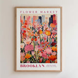 The image is a framed poster of a flower market in Brooklyn, New York.