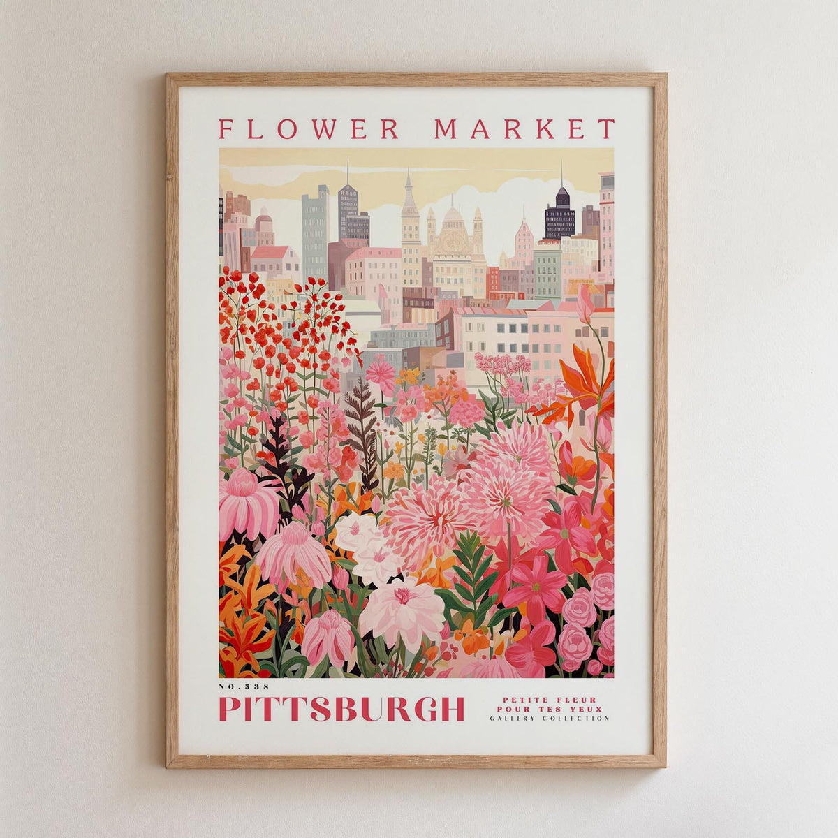 A framed poster depicting a vibrant cityscape with a variety of colorful flowers in the foreground, set against a backdrop of tall buildings.