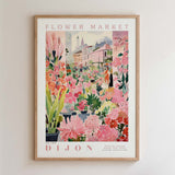 The image is a framed poster depicting a vibrant and colorful flower market scene.